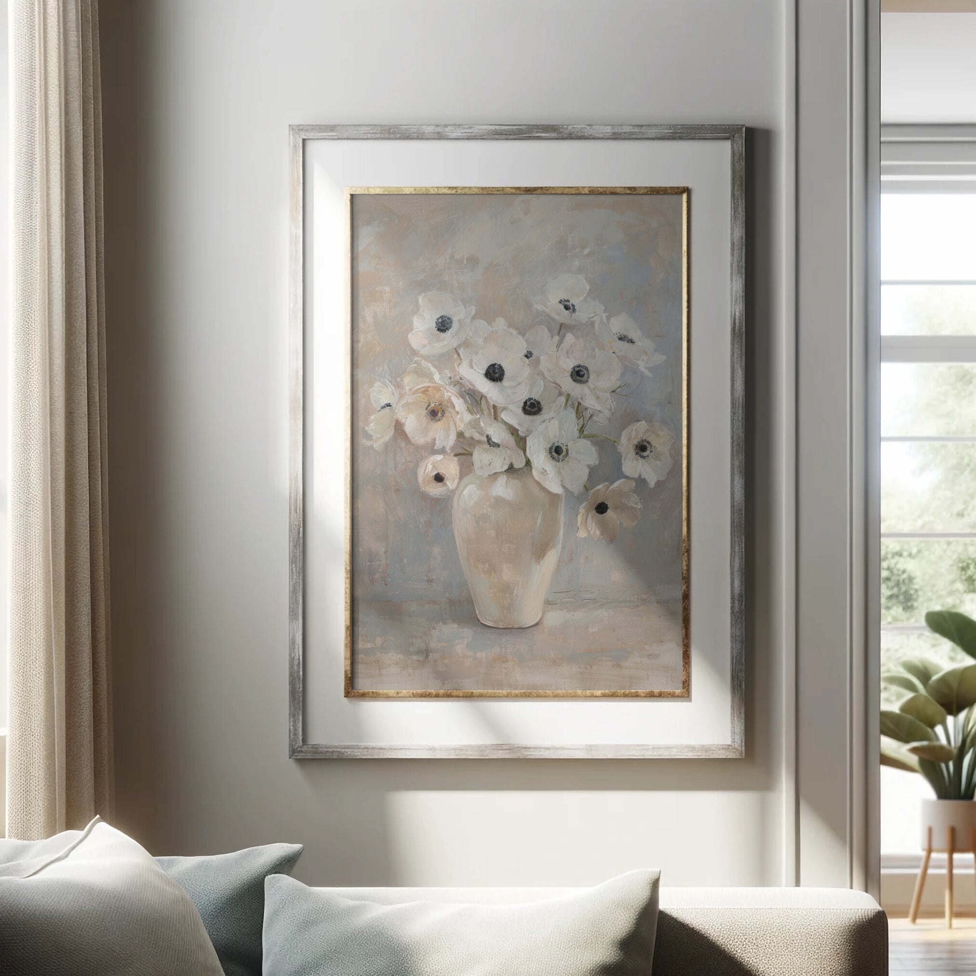 Framed painting of flowers on a wall in a living room