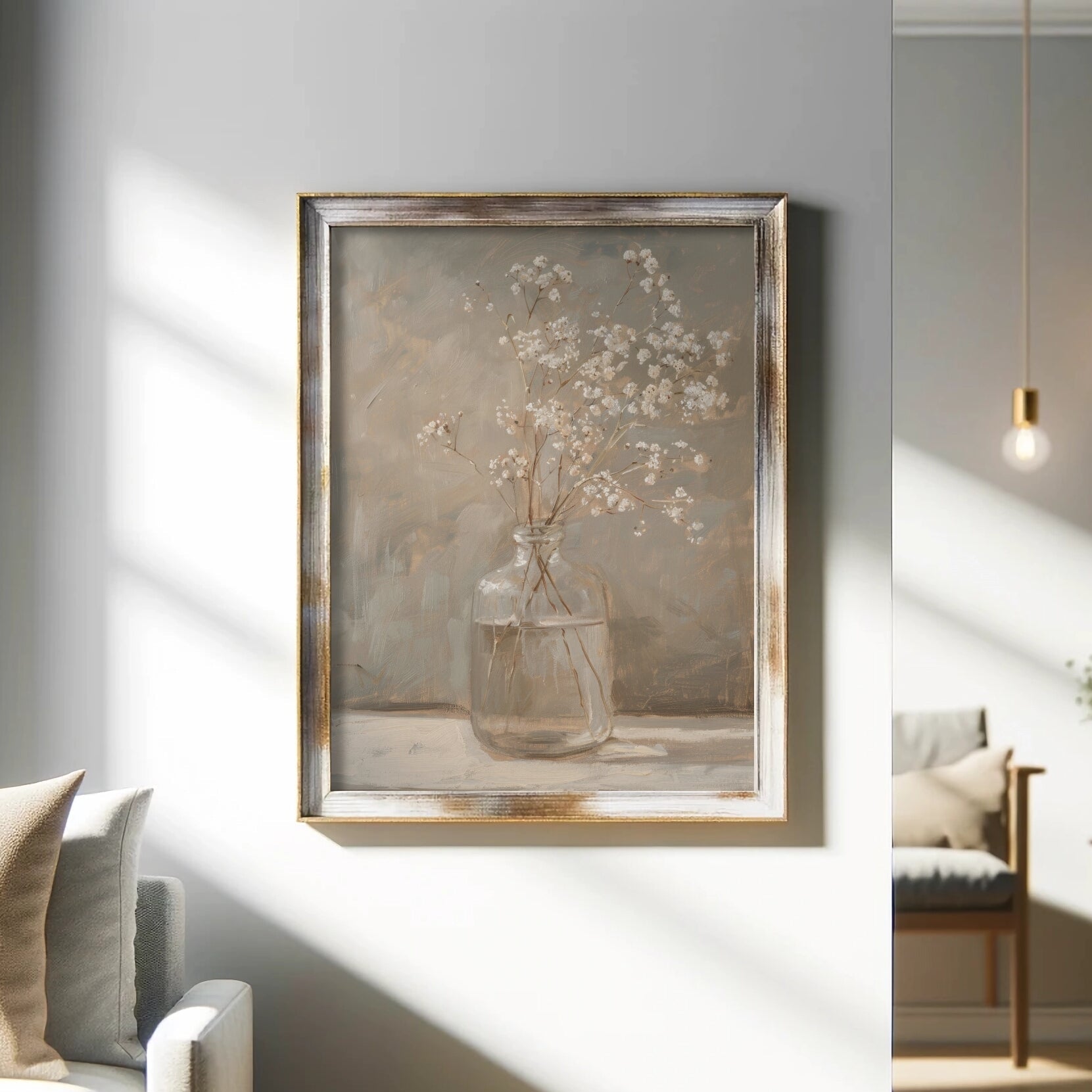 Framed artwork of a vase with flowers on a wall in a living room.