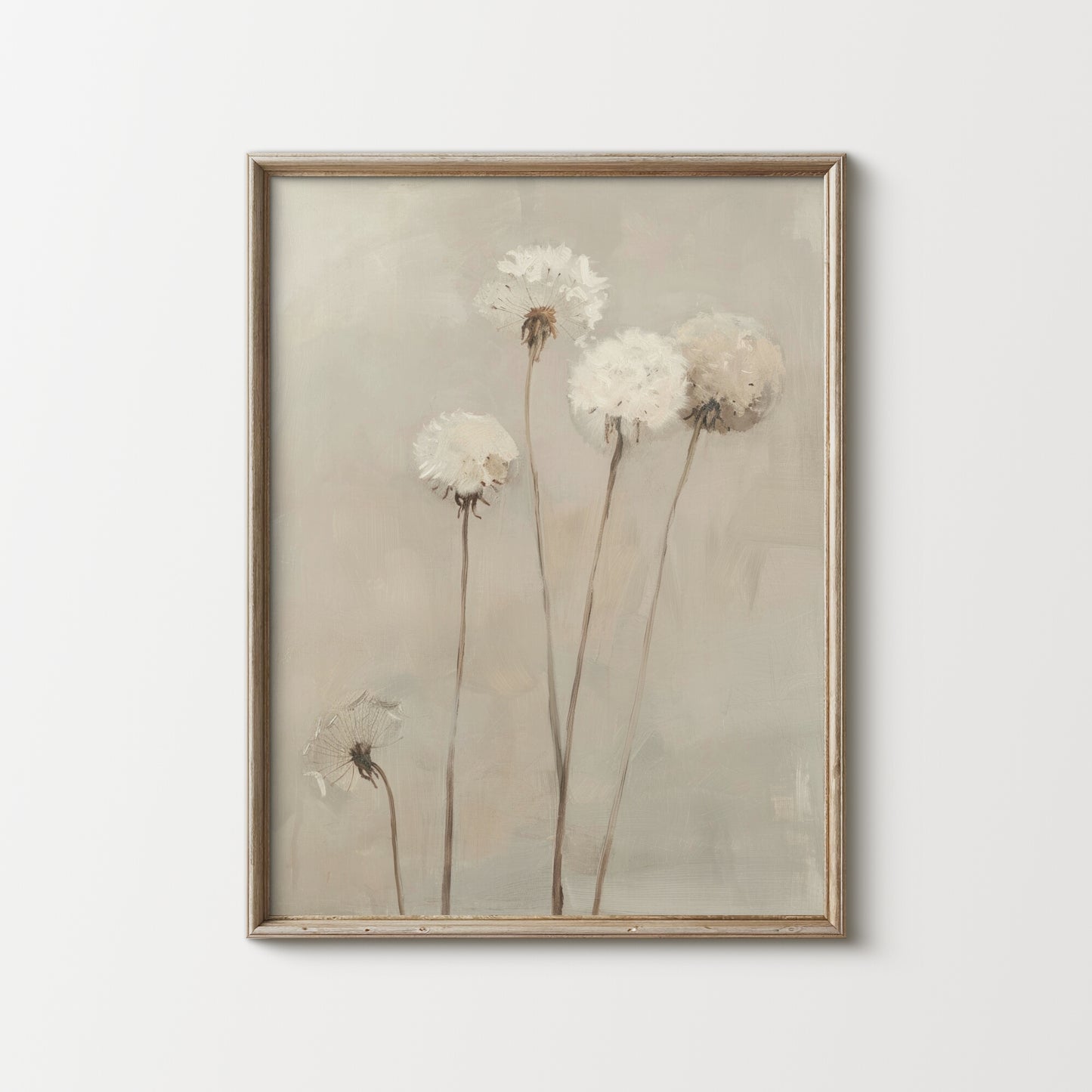 Framed artwork of dandelions on a light background