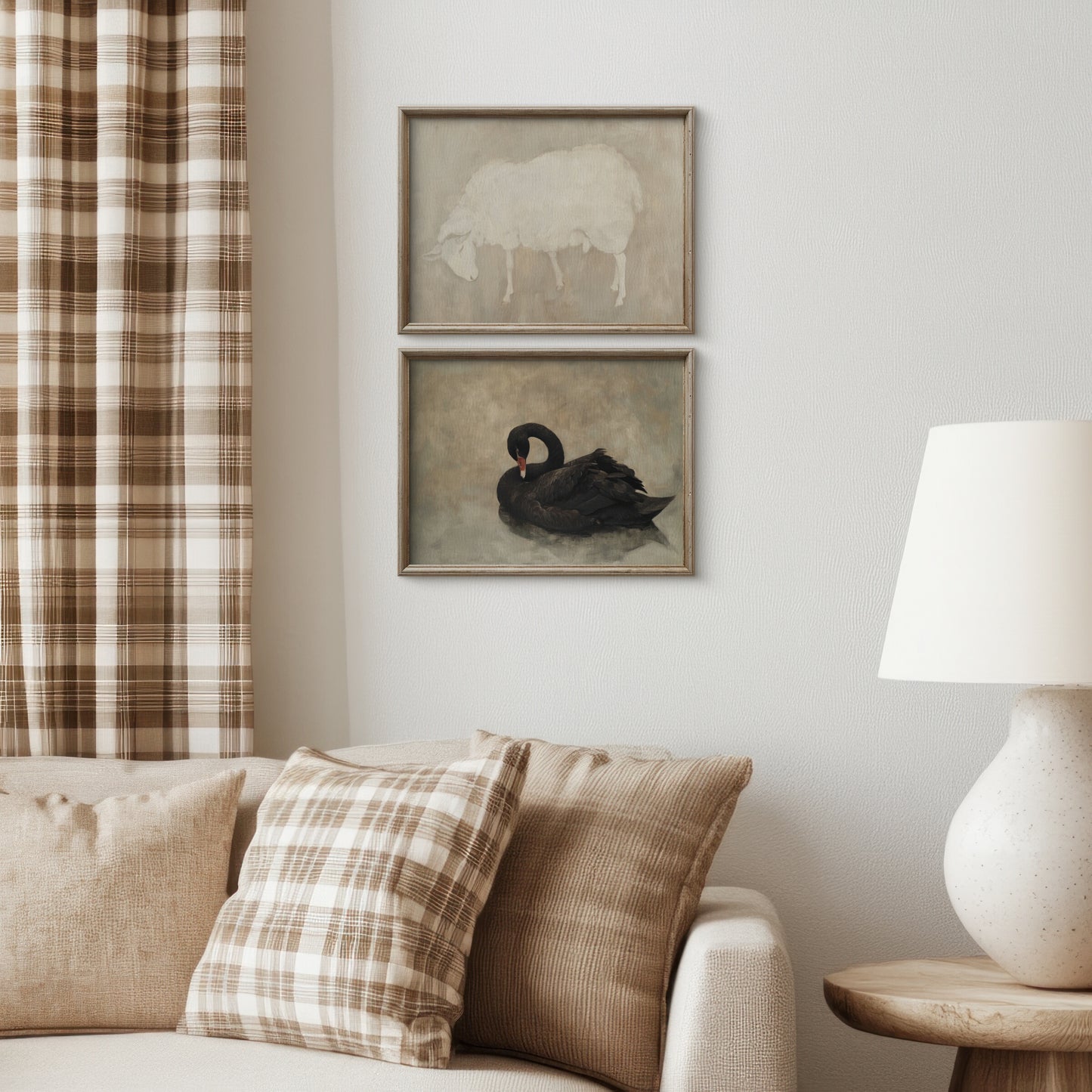 Living room with framed artwork of a sheep and a swan on the wall, plaid curtains, and a lamp.