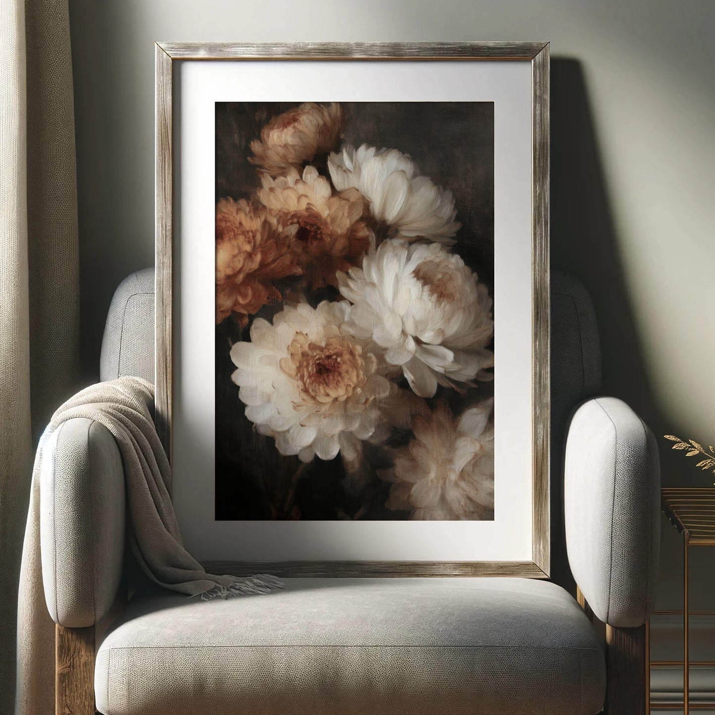 Framed floral artwork on a gray armchair