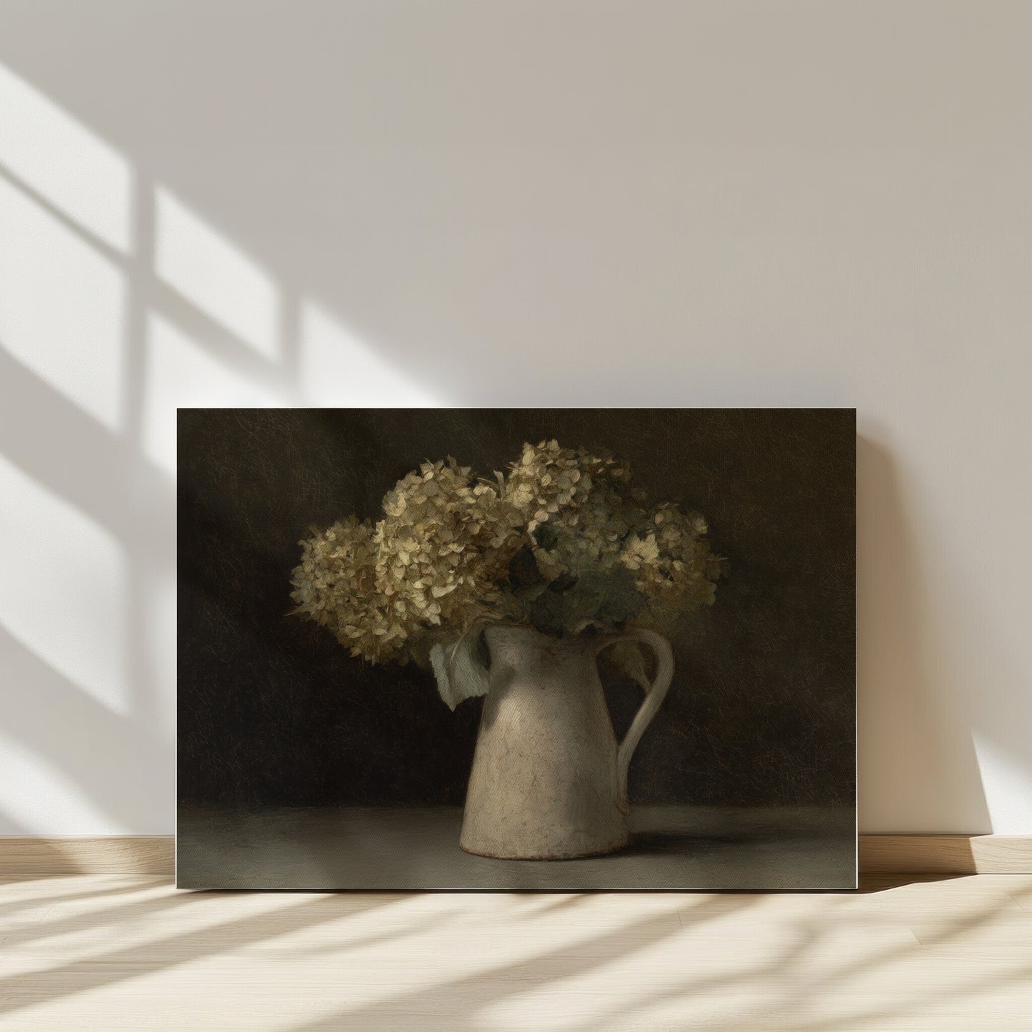 Vintage pitcher with dried flowers on a dark background, casting shadows on a light wall.