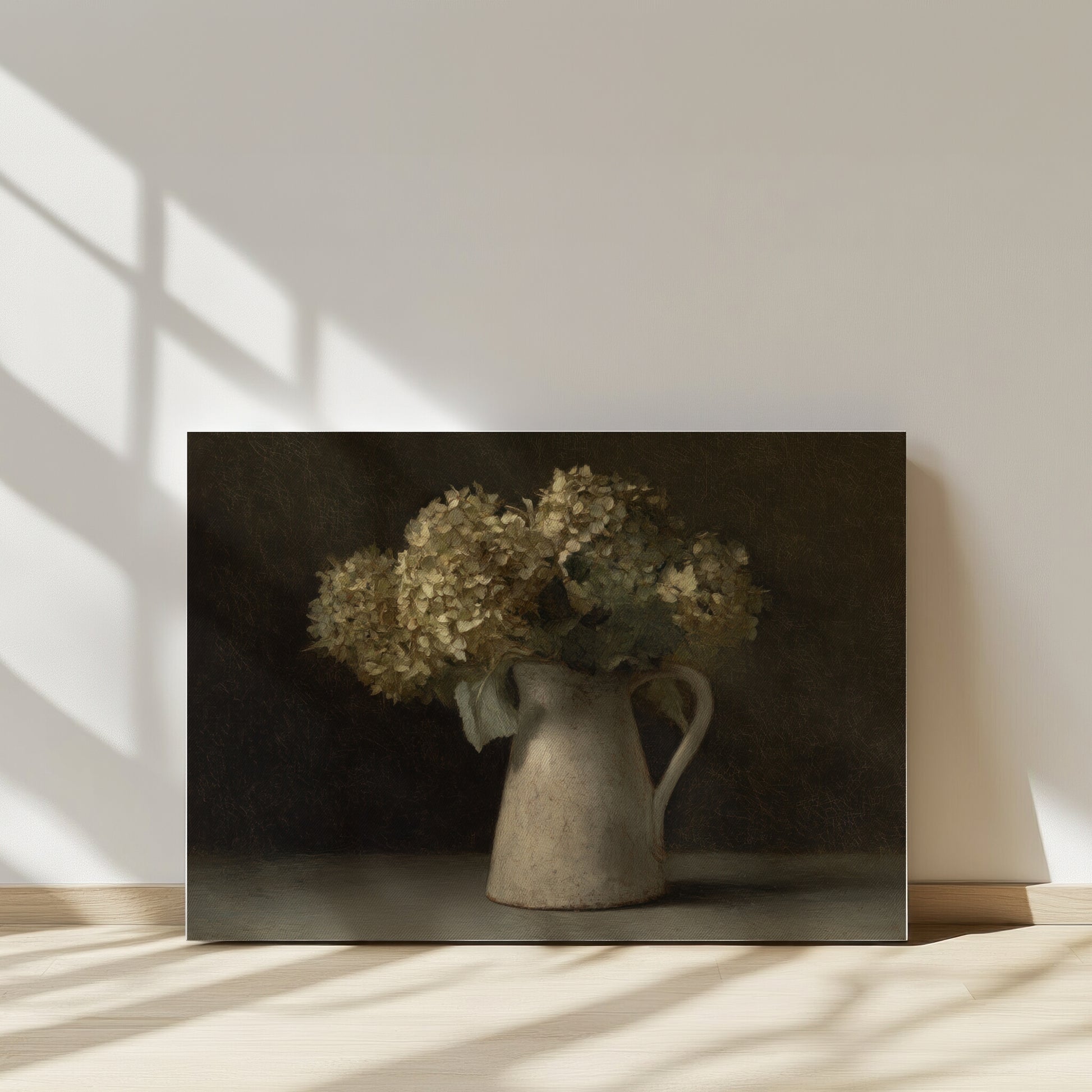 Vintage pitcher with dried flowers on a dark background, casting shadows on a light wall.
