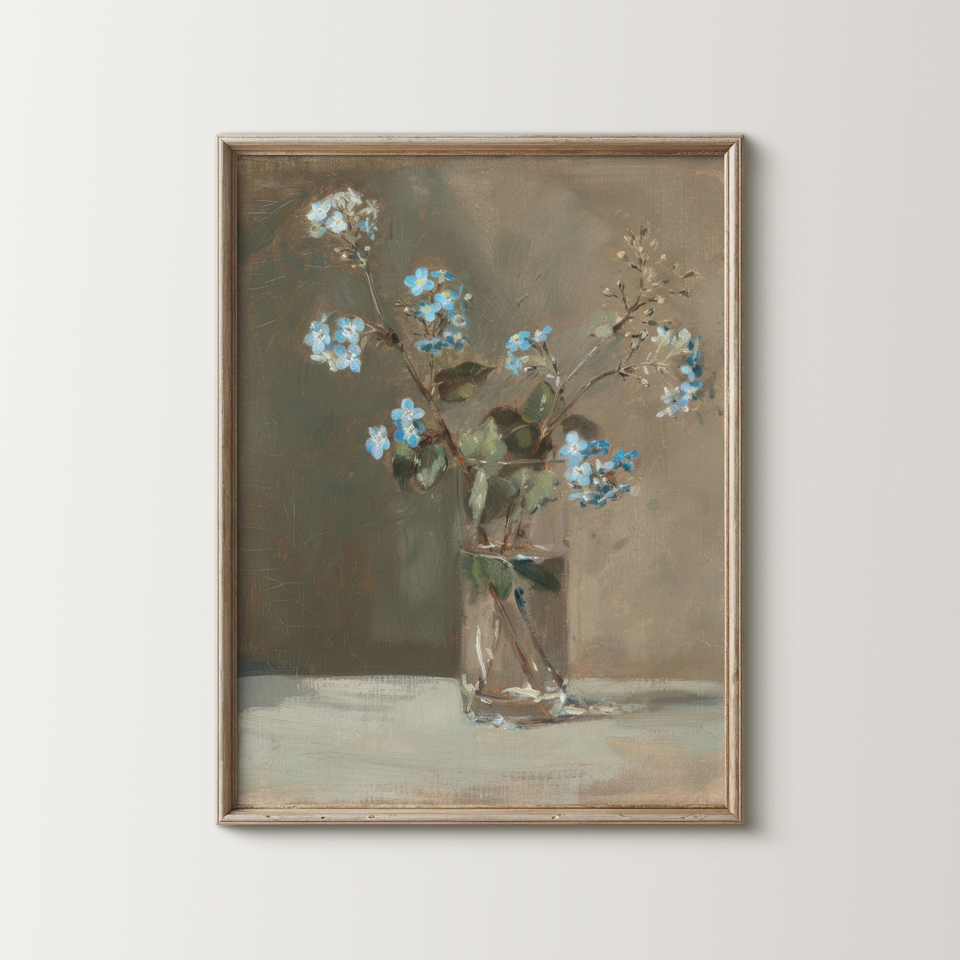 Framed painting of a still life with flowers in a glass vase on a neutral background