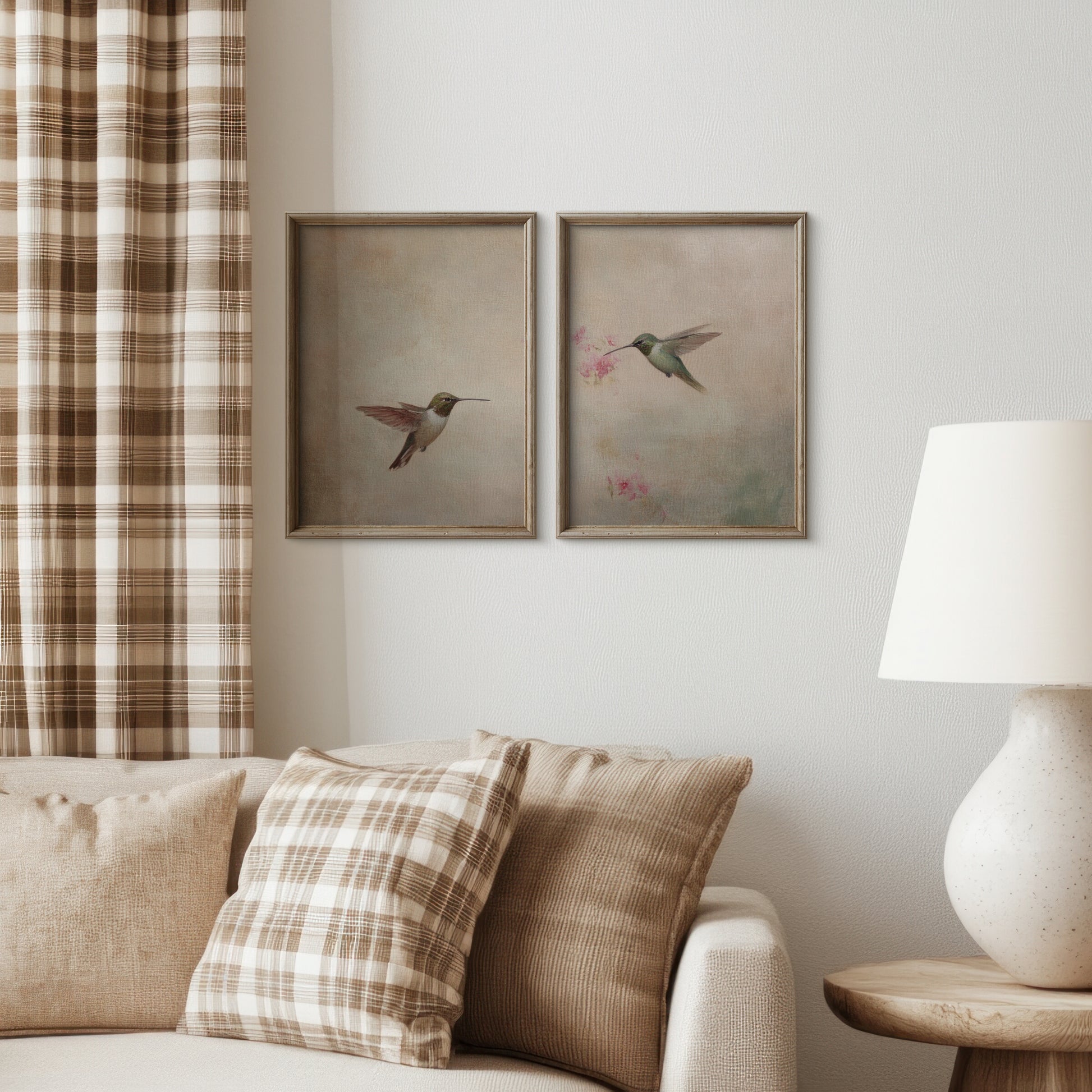 Living room with framed artwork of birds on the wall, plaid curtains, and a beige sofa.