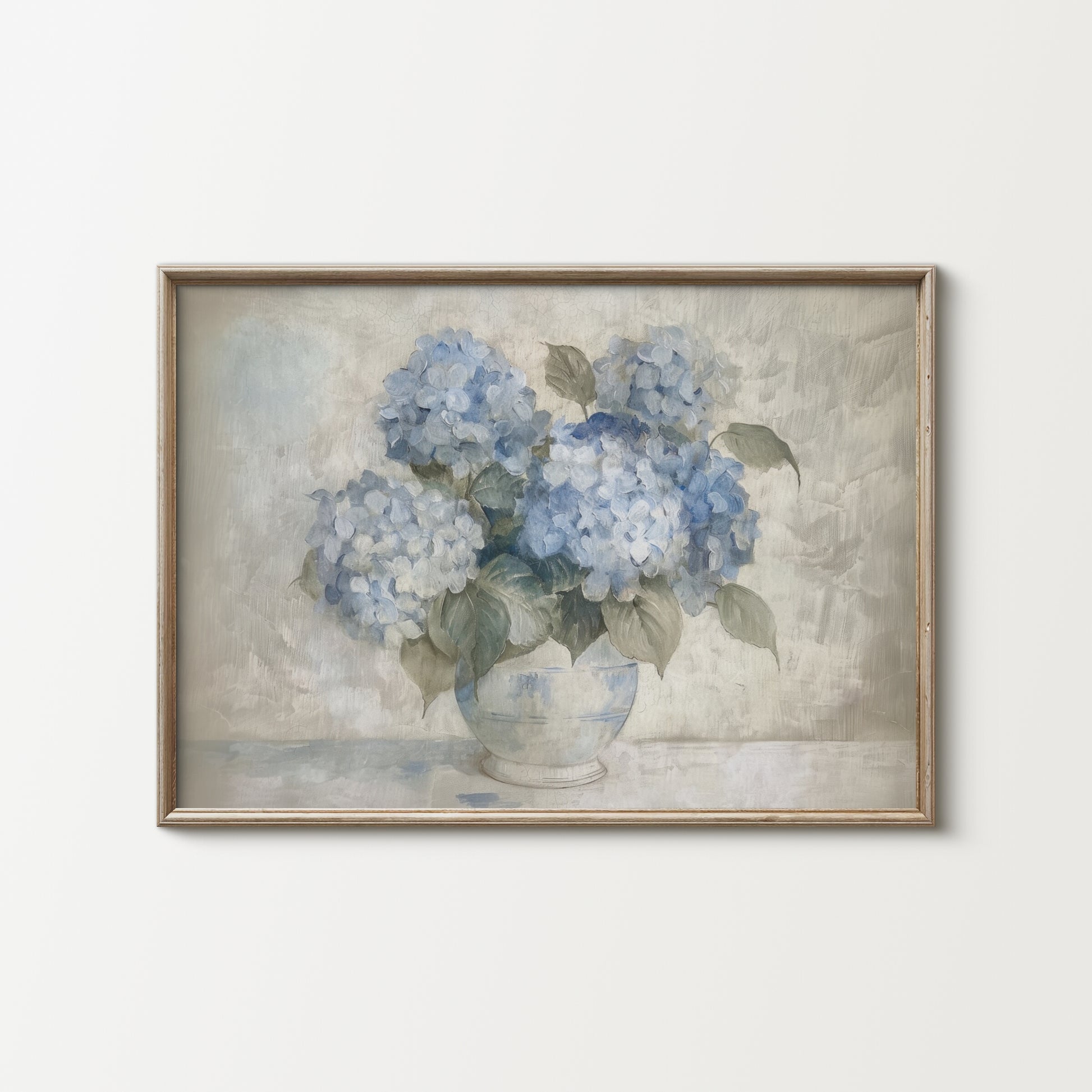 Framed artwork of blue hydrangeas in a vase on a textured background