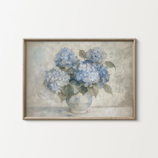 Framed artwork of blue hydrangeas in a vase on a textured background