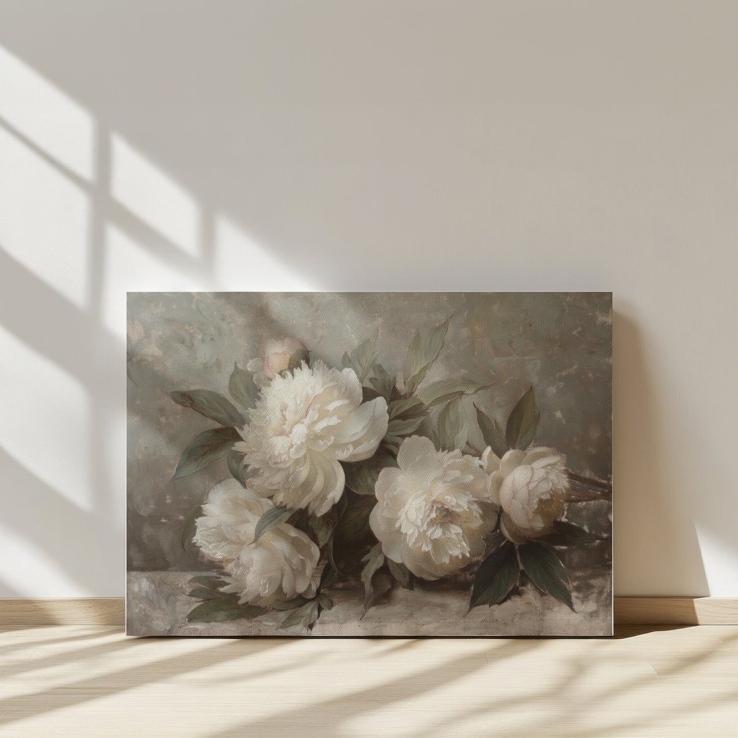Framed floral artwork on a wall with sunlight casting shadows.