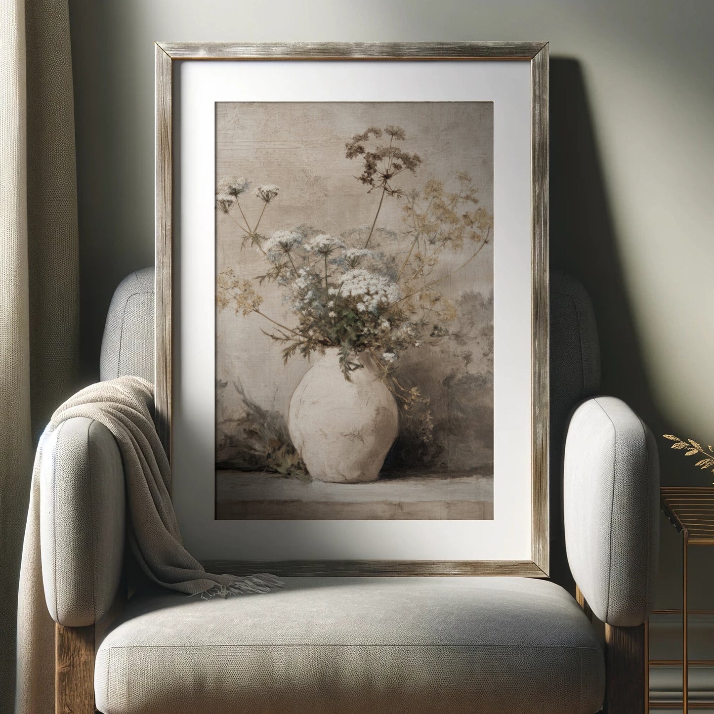Framed artwork of a vase with flowers on a chair