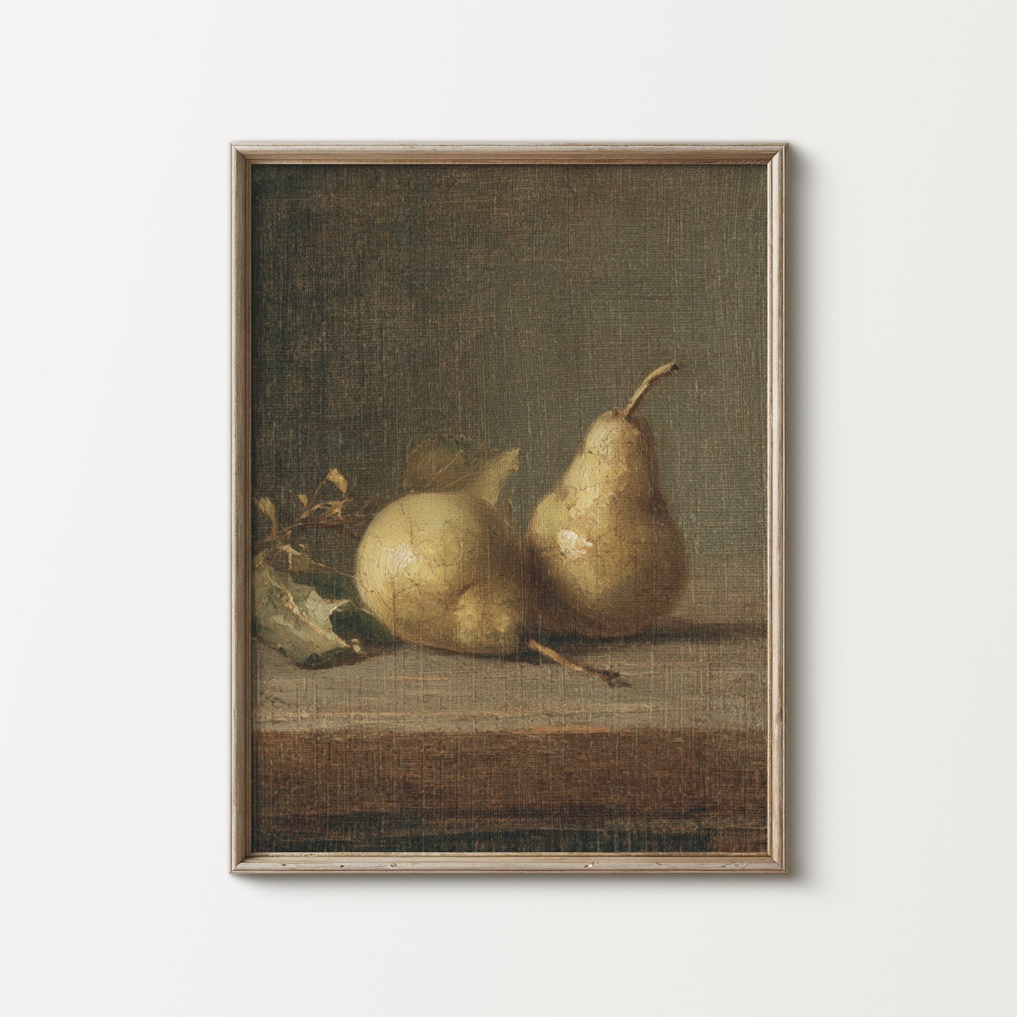 Framed artwork of two pears on a textured surface with a neutral background