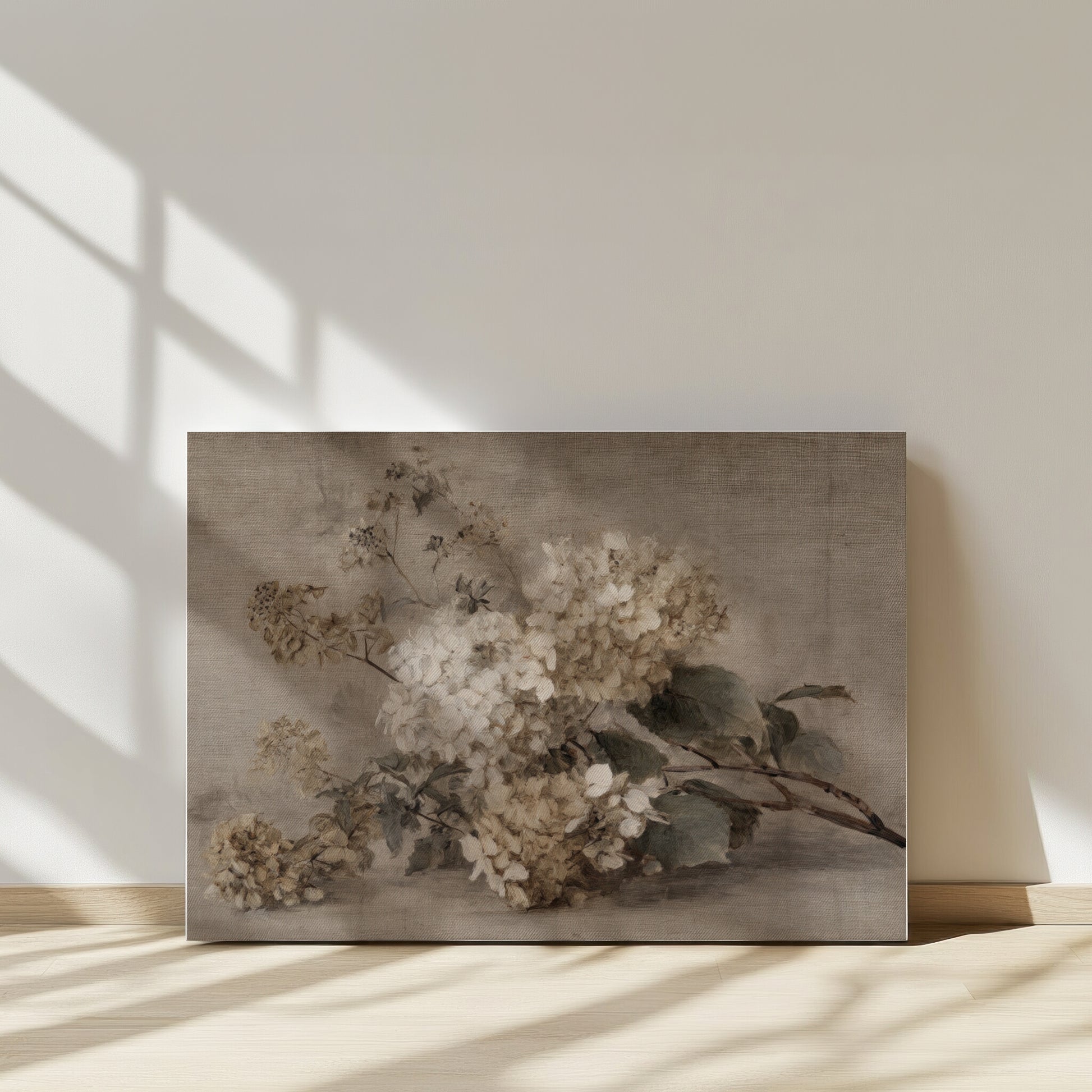Canvas print of a floral arrangement on a wall with sunlight casting shadows.