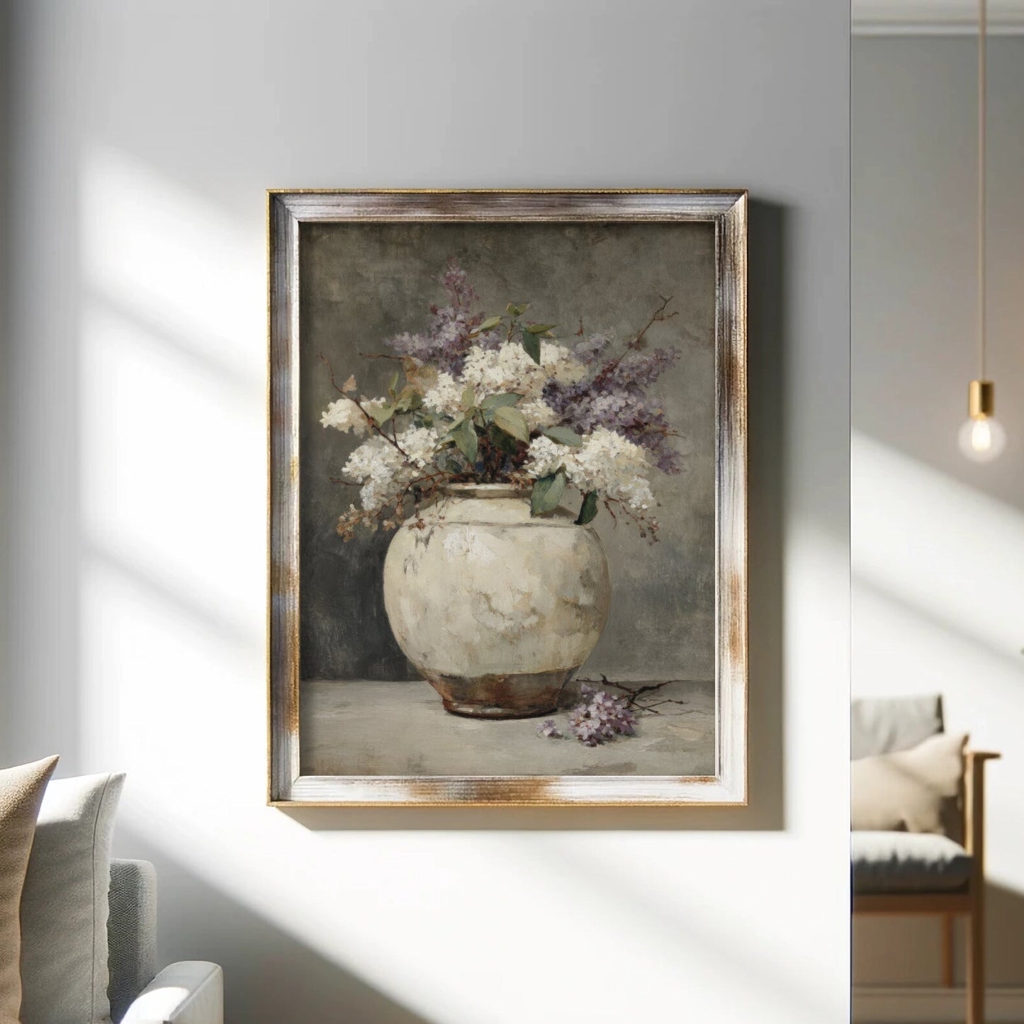 Framed painting of a vase with flowers in a living room setting