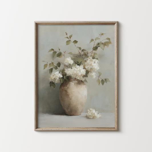Framed artwork of a vase with flowers on a light background