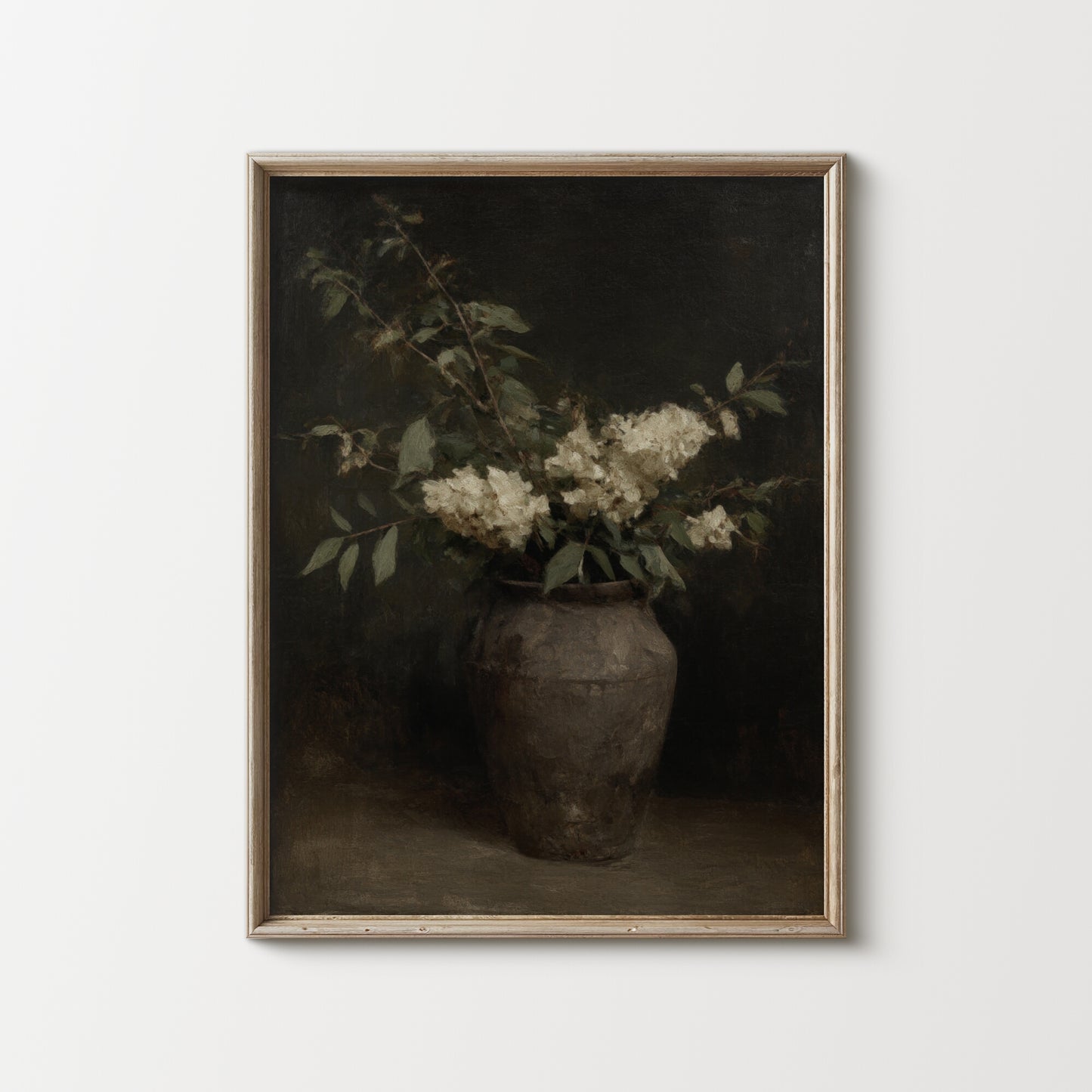 Framed artwork of a vase with flowers on a white background