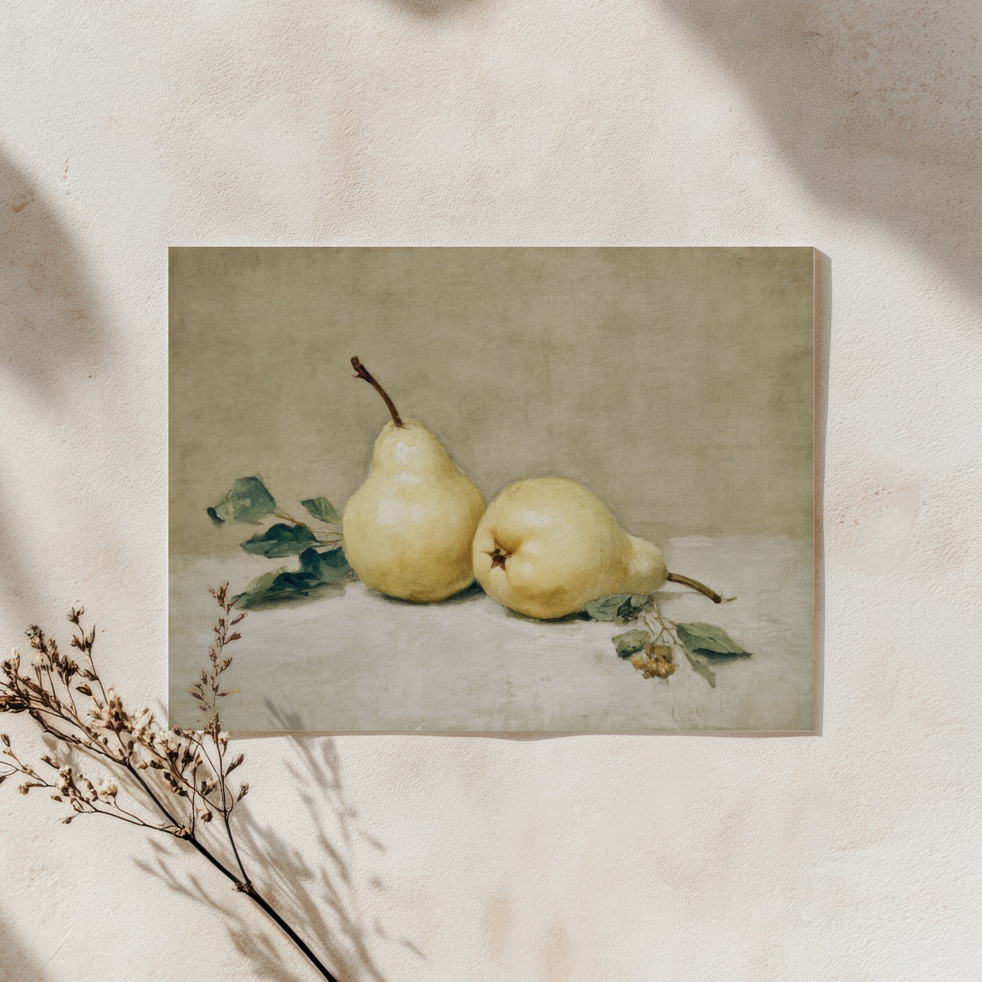 Two pears on a stone surface with leaves and flowers, framed by natural light.